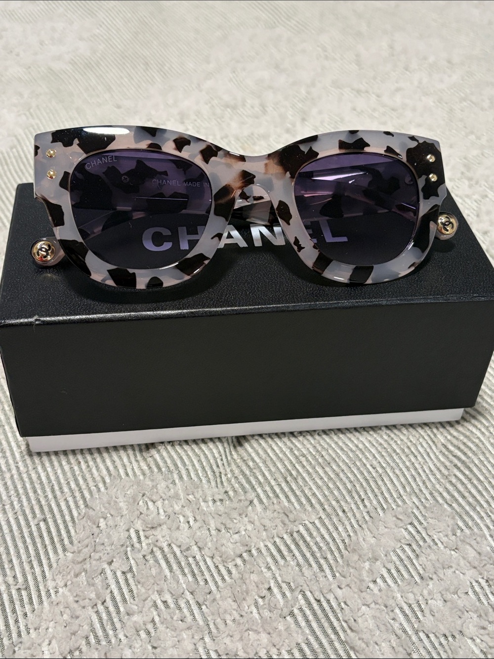 White and Black Tortoiseshell Square Sunglasses with Purple Lenses